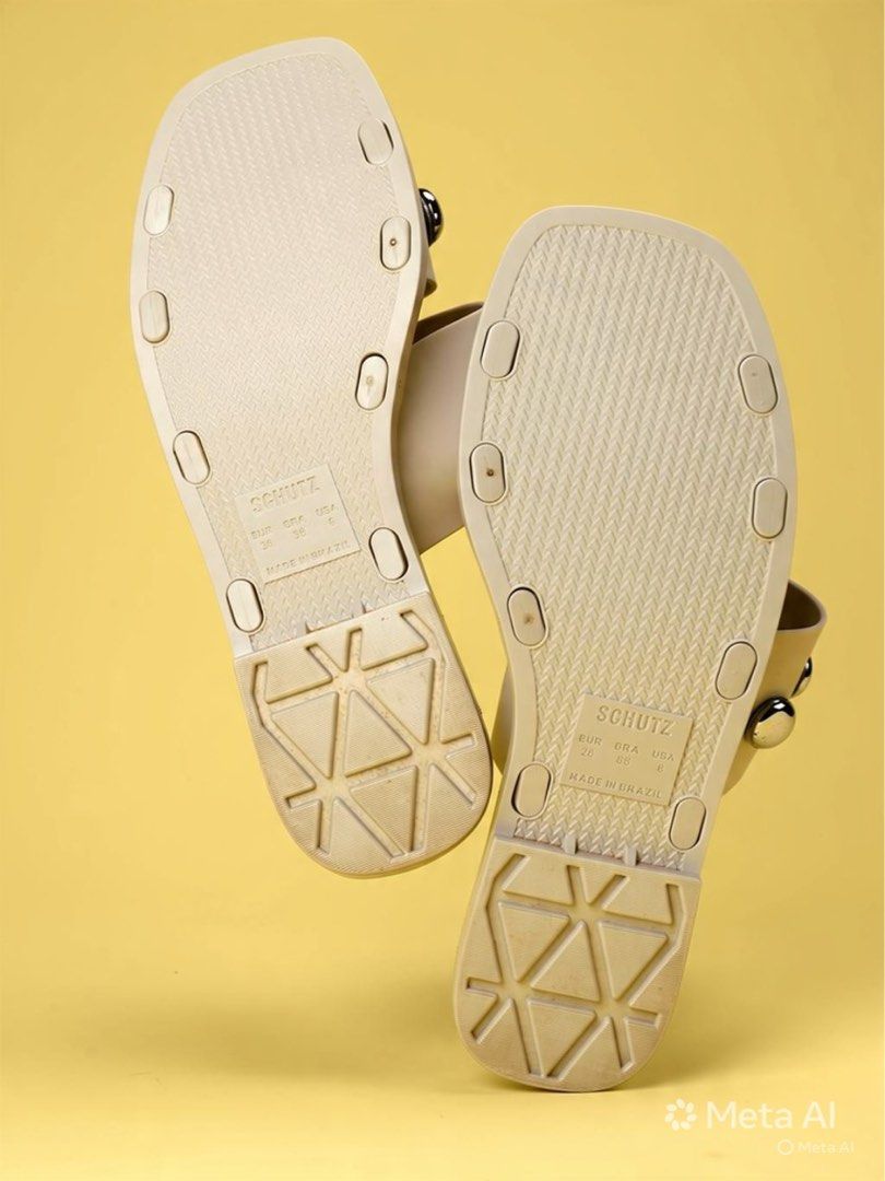 Schutz Studded White Sandals (Category: Flats & Sandals) located in Antipolo. Submitted by cl026 (Listing ID 1435016618, Image 2). Description: - Schutz sandals in white - Double-strap design - Silver-colored studs - Light beige soles - Made in Brazil - Size 36 EUR / 6 USA.