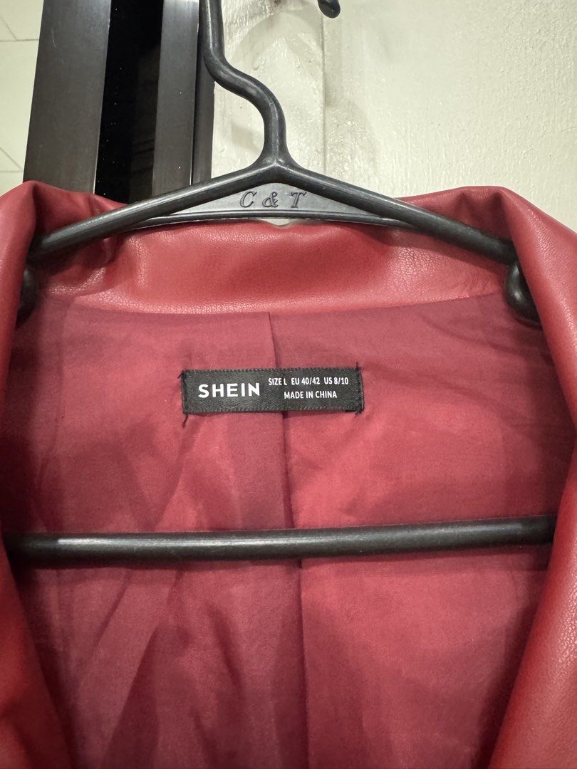 SHEIN Red Faux Leather Jacket - Size L (Category: Coats, Jackets and Outerwear) located in Valenzuela. Submitted by prelovedbykendall (Listing ID 1435111159, Image 2). Description: - SHEIN Red Faux Leather Jacket - Size: L - Features: - Zip-up front - Collared neckline - Elastic cuffs and hem - Two front pockets - Stylish and versatile design.