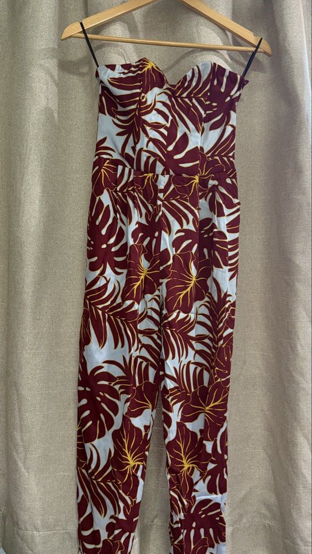 H&M Strapless Floral Jumpsuit (Category: Jumpsuits) located in Manila. Submitted by tinam143 (Listing ID 1435065878, Image 3). Description: - Strapless jumpsuit - Floral print: maroon and yellow on light blue - Fitted bodice - Straight leg design - Lightweight fabric - Perfect for warm weather.