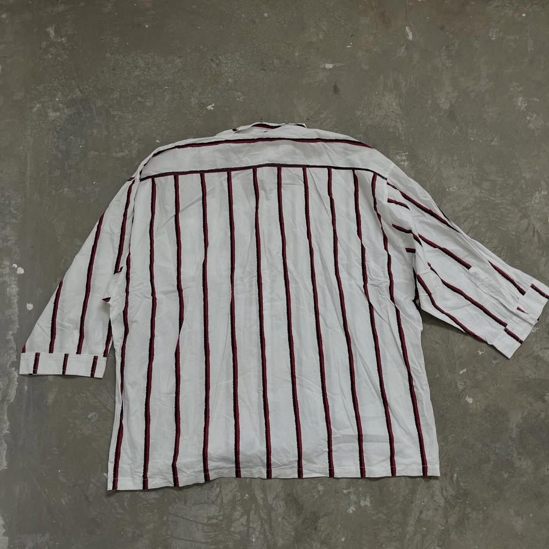 Stripe Button-Down Polo Shirt (Category: Tshirts & Polo Shirts ) located in Quezon City. Submitted by wipdeclutter (Listing ID 1435039239, Image 2). Description: (measured in inches) Length 28-29 Width (pit) 26 Sleeve length 16 Shoulder width 23 Like new [See photos for details].