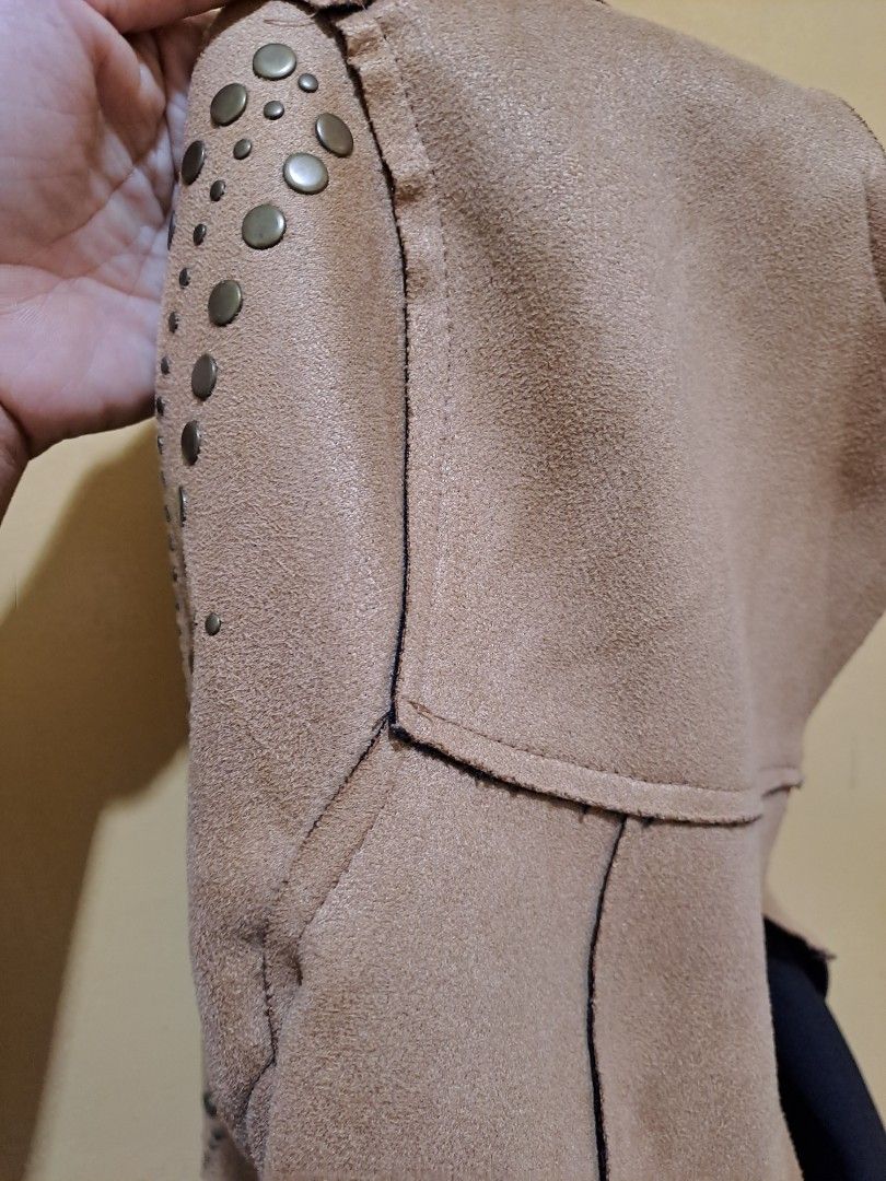 Tan Suede Jacket with Studded Sleeves (Category: Coats, Jackets and Outerwear) located in Baguio. Submitted by Zibs_Collection (Listing ID 1435084572, Image 3). Description: - Stylish tan suede jacket - Studded sleeves - Classic open front - Black inner lining fits xs to small, no more LP.