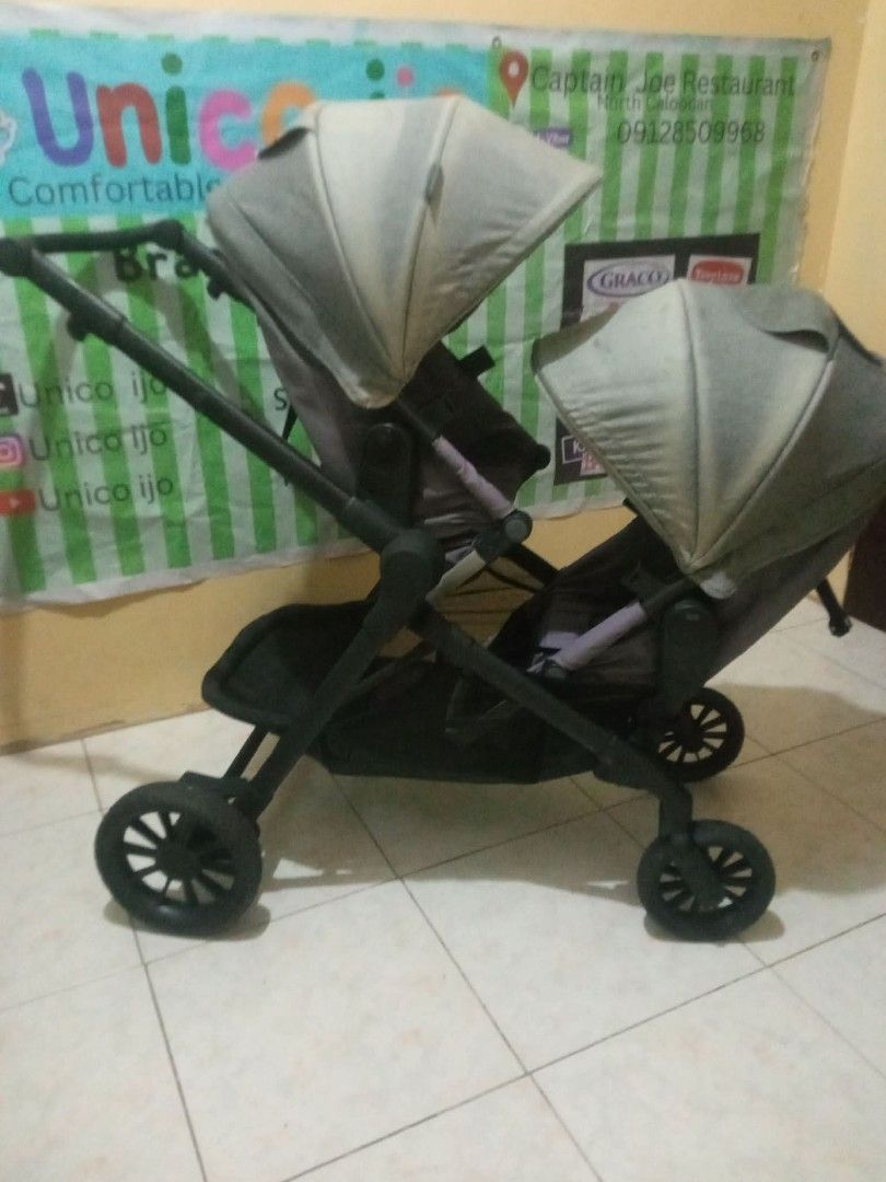 Tandem Stroller (Category: Strollers) located in Caloocan City. Submitted by Unicoijo02 (Listing ID 1435062531, Image 3). Description: - Double stroller - Two seats with canopies - Black frame - Gray seats - Storage basket included - Four wheels - Perfect for two children.