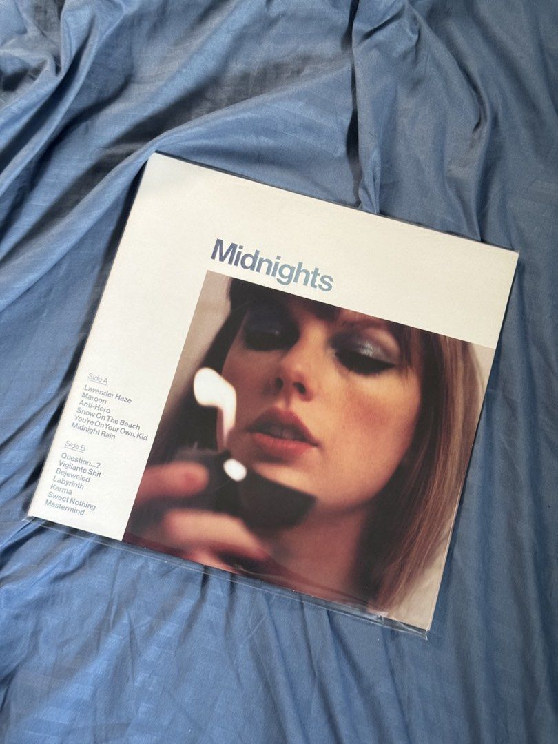 taylor swift midnights moonstone blue vinyl (Category: Vinyls) located in Malabon City. Submitted by 97carts (Listing ID 1435081813, Image 1). Description: rfs: decluttering; vinyl player is broken note: amateur collector no visible warping on the record not sure about skips please only transact if comfortable!.