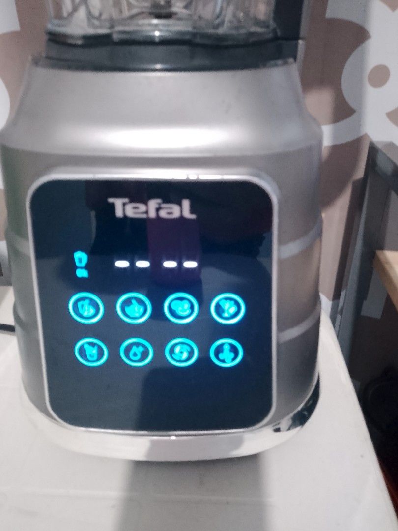 Tefal Blender (Category: Juicers, Blenders & Grinders) located in Manila. Submitted by badkiss_coffee26 (Listing ID 1435057693, Image 2). Description: - Sleek Tefal blender with a modern design. - Features a user-friendly digital control panel. - Offers multiple pre-set functions for various blending tasks. - Comes with a large capacity container. - Equipped with a sturdy handle for easy pouring. - Boasts a stylish metallic base. - Perfect for ma
