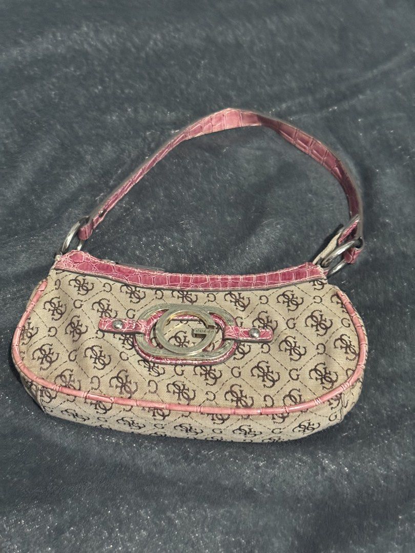 Y2K Vintage Guess Bag (Category: Luxury Bags & Wallets) located in Talisay, Batangas. Submitted by pret.sells (Listing ID 1435128670, Image 2). Description: -the bag has a zip closure and fixed strap -everyday bag for pink girlies 🩷 -see last photo for stain, not really visible .
