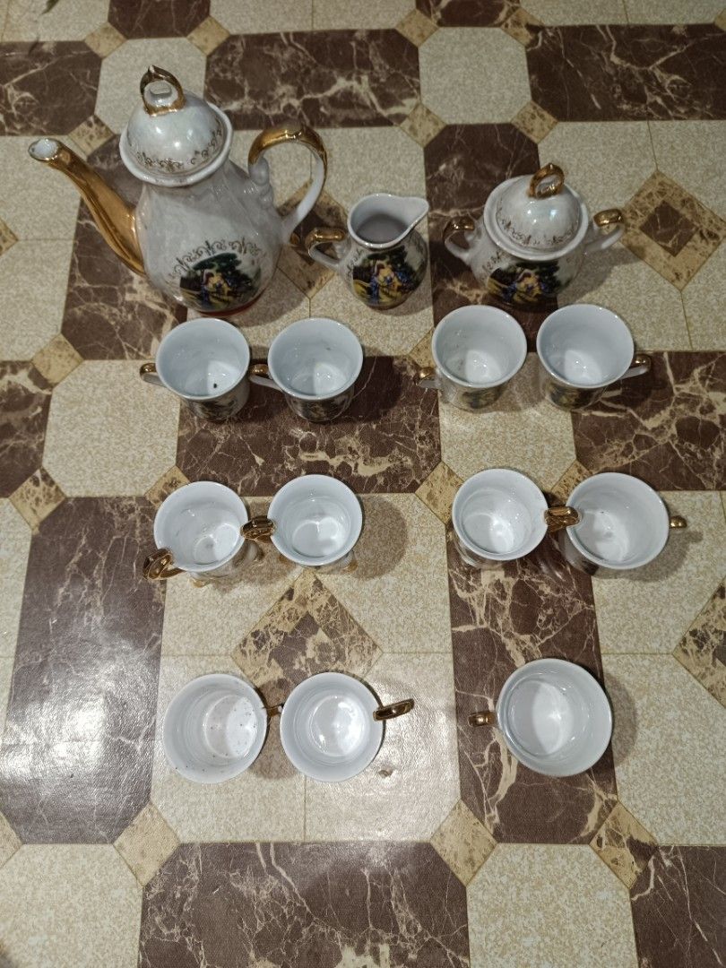 Vintage Porcelain Tea Set (Category: Coffee & Tea Tableware) located in Manila. Submitted by caaths_collection (Listing ID 1435072539, Image 3). Description: - Vintage porcelain tea set - Includes teapot, sugar bowl, creamer, and teacups - Features gold trim - Decorative scenes on each piece - Ideal for serving tea or display - Perfect for collectors - original Vintage Porcelain Tea Set.