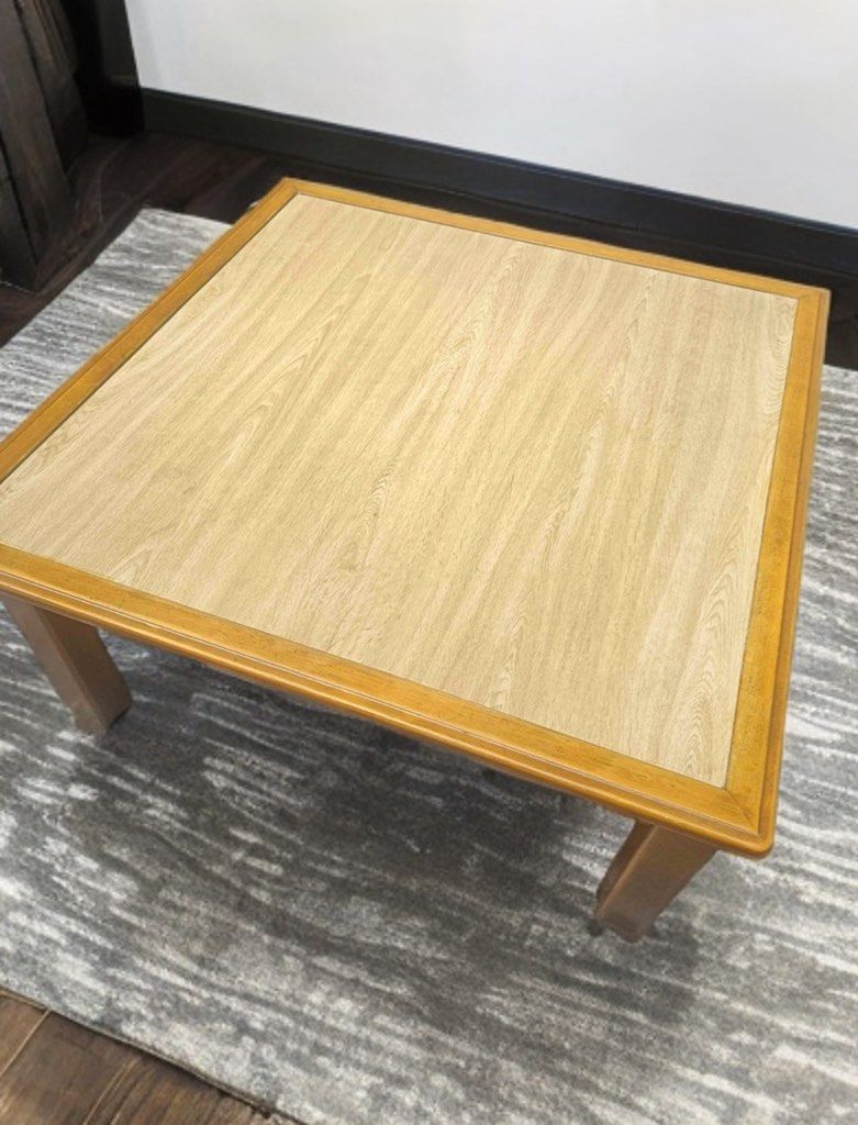 Coffee Table aesthetic (Category: Tables & Sets) located in Quezon City. Submitted by home_ikigai (Listing ID 1435163690, Image 2). Description: - Japan zen low square coffee table - Wooden frame - Light-colored tabletop with wood grain - Simple, classic design - Suitable for various room styles -Convertible top (light-brown and white) -Dimensions: Length & Width 90 cm Height 37 cm -Location: Bagumbong Caloocan -team kahoy.