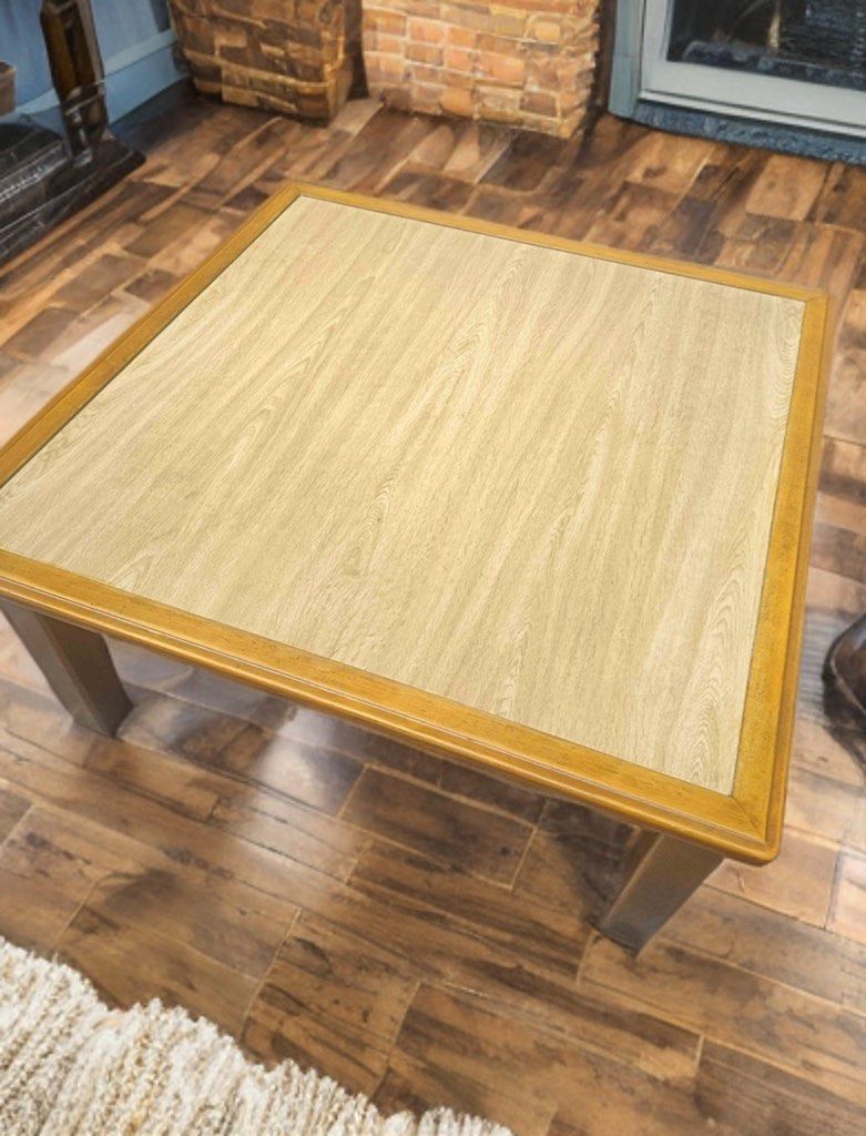 Coffee Table aesthetic (Category: Tables & Sets) located in Quezon City. Submitted by home_ikigai (Listing ID 1435163690, Image 1). Description: - Japan zen low square coffee table - Wooden frame - Light-colored tabletop with wood grain - Simple, classic design - Suitable for various room styles -Convertible top (light-brown and white) -Dimensions: Length & Width 90 cm Height 37 cm -Location: Bagumbong Caloocan -team kahoy.