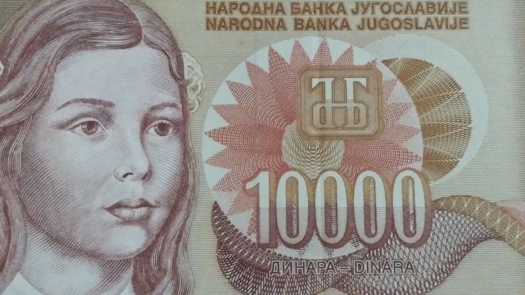 Yugoslavia 10000 Dinara Banknote (Category: Currency) located in Cainta. Submitted by patrickwilsonstore (Listing ID 1435165854, Image 3). Description: - Yugoslavian 10000 Dinara banknote - Year: 1989 - Features a portrait of a young woman - Serial number: AE 9285884 - From Beograd unc. but with fold. .