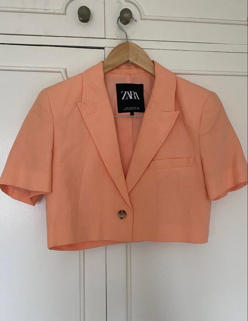 Zara Peach Blazer and Shorts Set (Category: Sets or Coordinates) located in Manila. Submitted by byebuyna (Listing ID 1435044413, Image 2). Description: - Zara peach blazer and shorts set - Blazer: short sleeves, single-button closure - Skorts: unique wrap design - Perfect for casual or semi-formal wear - A versatile wardrobe addition.