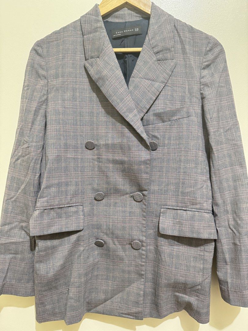 Zara Woman Double-Breasted Blazer (Category: Coats, Jackets and Outerwear) located in Mandaluyong City. Submitted by riaria03 (Listing ID 1435152168, Image 1). Description: - Zara Woman plaid double-breasted blazer - Classic notched lapel - Two front pockets - Double-breasted button closure - With complete buttons and spare - Lining: I intentionally removed it to fit my arms🤭 - Size: EUR 36 (US 00S, MEX 22) 📍Please note that actual colors may s