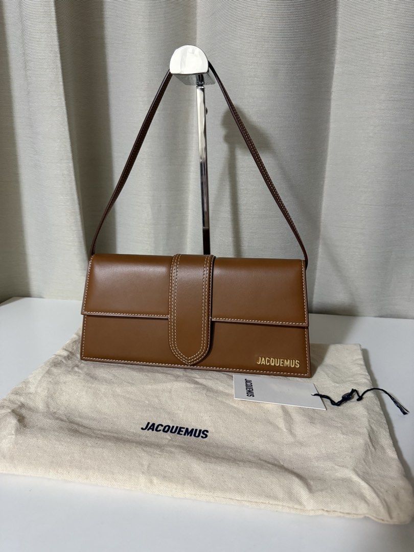 101% Authentic Jacquemus Le Bambino Bag (Category: Luxury Bags & Wallets) located in Quezon City. Submitted by signatree (Listing ID 1429872903, Image 1). Description: ✔️ 100% money back guaranteed if proven fake ✔️ Bought in Italy Jacquemus Le Bambino handbag in brown. Features a rectangular shape with a flap closure and a top handle. Includes a dust bag and a tag..