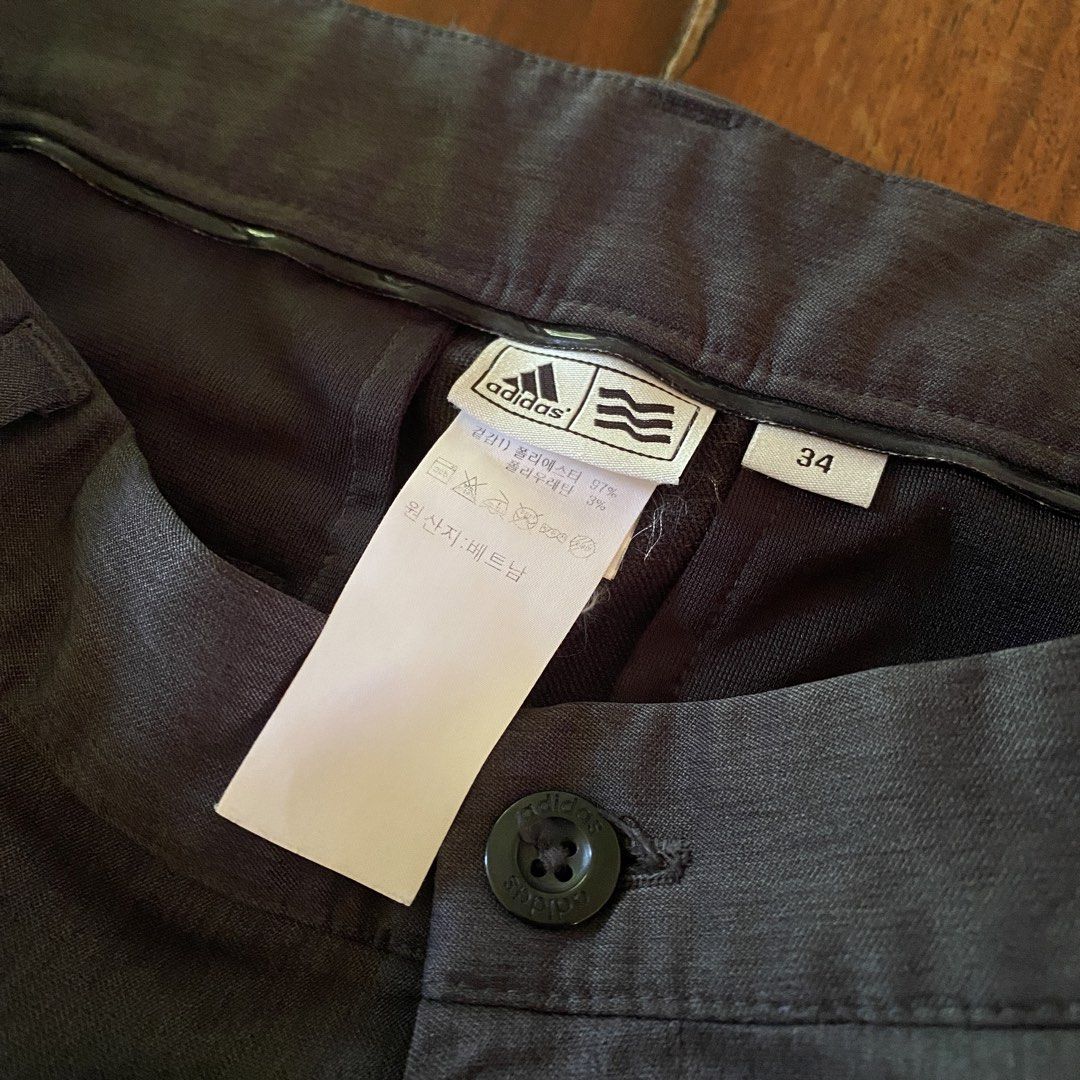 Adidas golf trousers (Category: Trousers) located in Naga. Submitted by decluttertingz_ (Listing ID 1429914793, Image 3). Description: Adidas dark grey golf trousers Size 34 on tag Actual measurements: Waist: 16.5” Leg: 13” Hem: 8” Length: 39” No issues good as new.