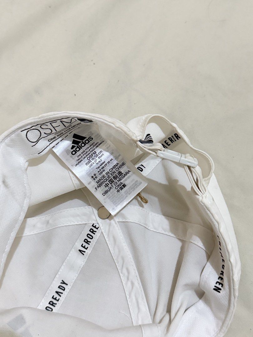 Adidas White cap (Category: Caps & Hats) located in Quezon City. Submitted by steffo_declutters (Listing ID 1429845262, Image 2). Description: .