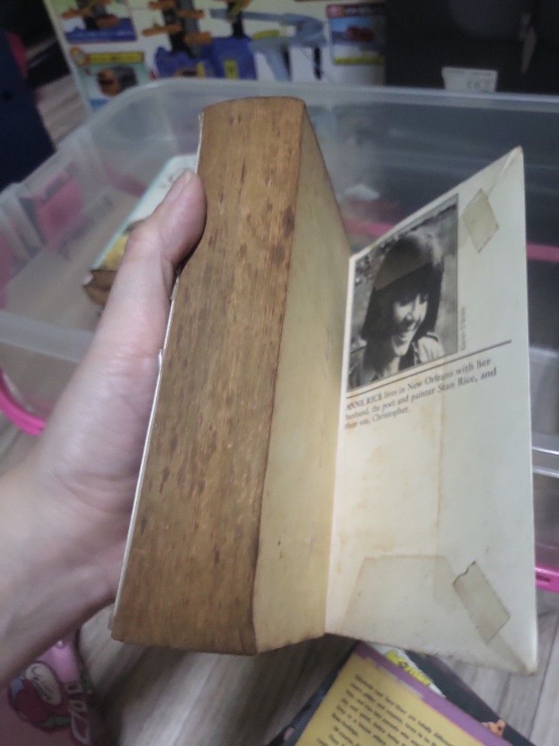 Anne Rice Lasher Book (Category: Storybooks) located in Caloocan City. Submitted by lynette1977 (Listing ID 1429964912, Image 3). Description: Copy of Anne Rice's novel, Lasher. The book has a purple cover with the title and author's name clearly visible. The back of the book contains text and a barcode..