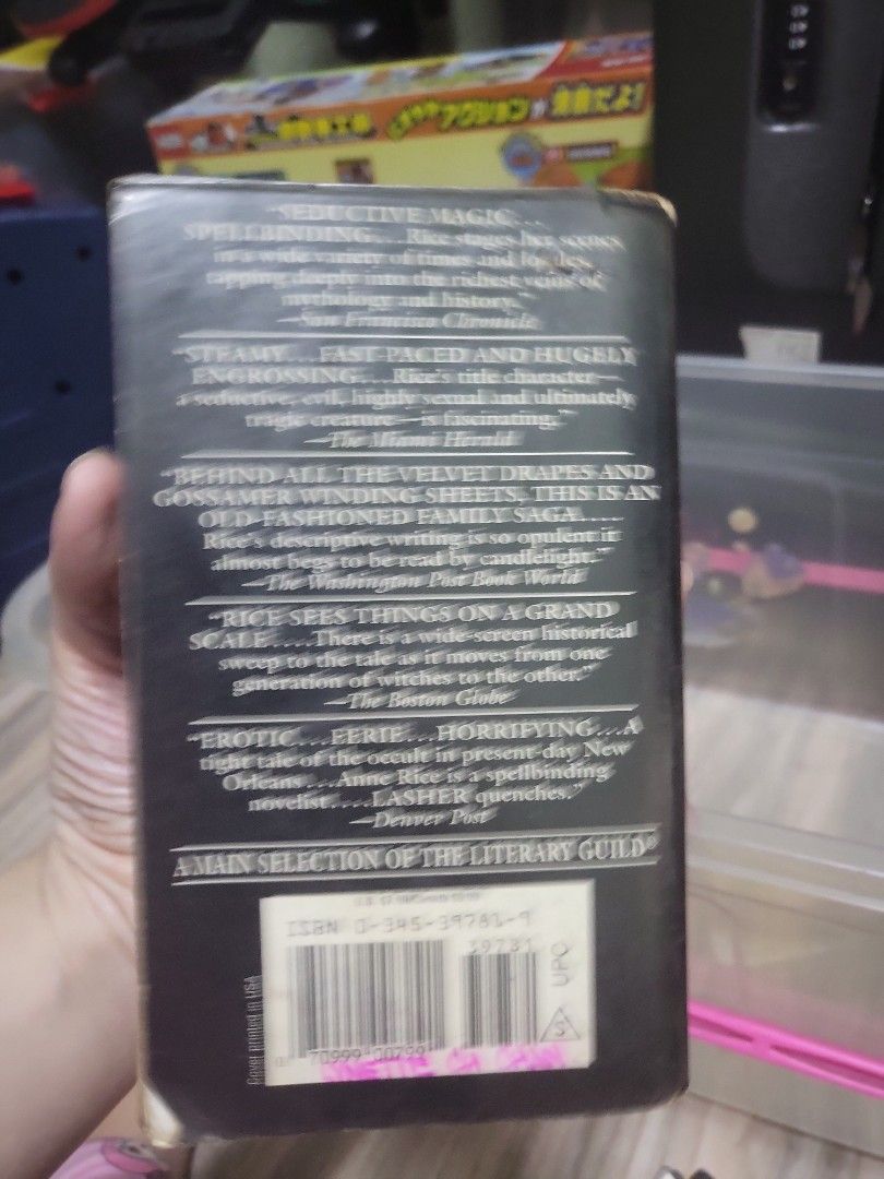 Anne Rice Lasher Book (Category: Storybooks) located in Caloocan City. Submitted by lynette1977 (Listing ID 1429964912, Image 2). Description: Copy of Anne Rice's novel, Lasher. The book has a purple cover with the title and author's name clearly visible. The back of the book contains text and a barcode..