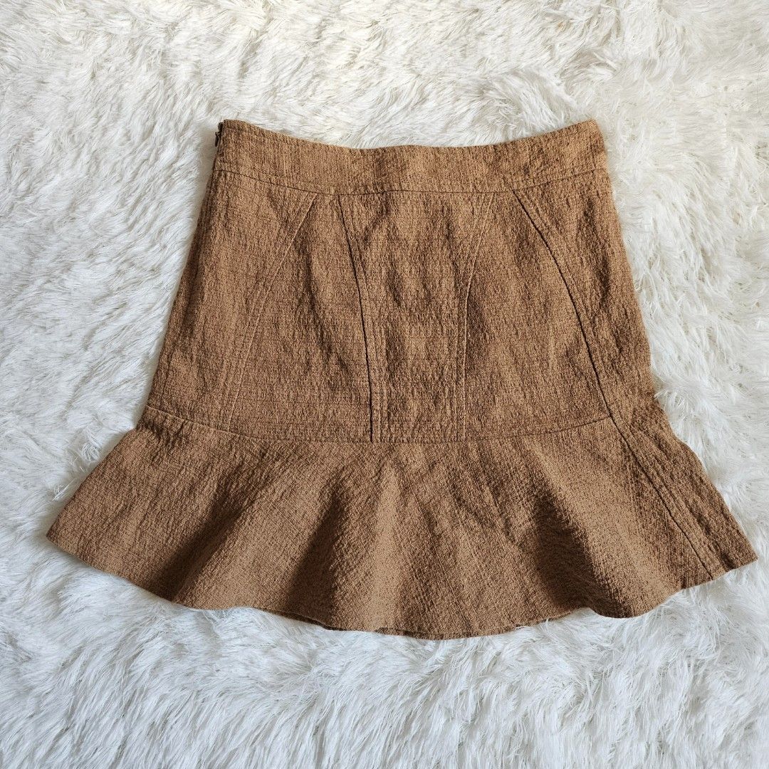 Apple Designs Brown Textured Frill Skirt (Category: Skirts) located in Cebu City. Submitted by falloutin (Listing ID 1429981938, Image 1). Description: Love this skirt! Very cute when worn but it doesn't fit me now. Size: S-M (measurements posted) - I don't have any ww for this - frill hem - textured fabric I have more clothes for sale in my account :) Location: Cebu City Payment: Gcash, Landbank, GoTyme Shipping: J&T or LBC.