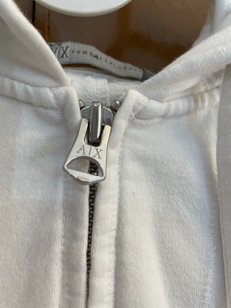 Armani Exchange White Zip-Up Hoodie (Category: Coats, Jackets and Outerwear) located in Quezon City. Submitted by mrslim91 (Listing ID 1429849646, Image 3). Description: Fits XS to S. RFS: Decluttering Note to buyers: We’ve been victims to scam purchases in this platform. To avoid that happening again, we will do the booking ourselves. Payment first via GCash. NO CASH FROM DELIVERY DRIVERS WILL BE ACCEPTED. Thanks for your cooperation. .