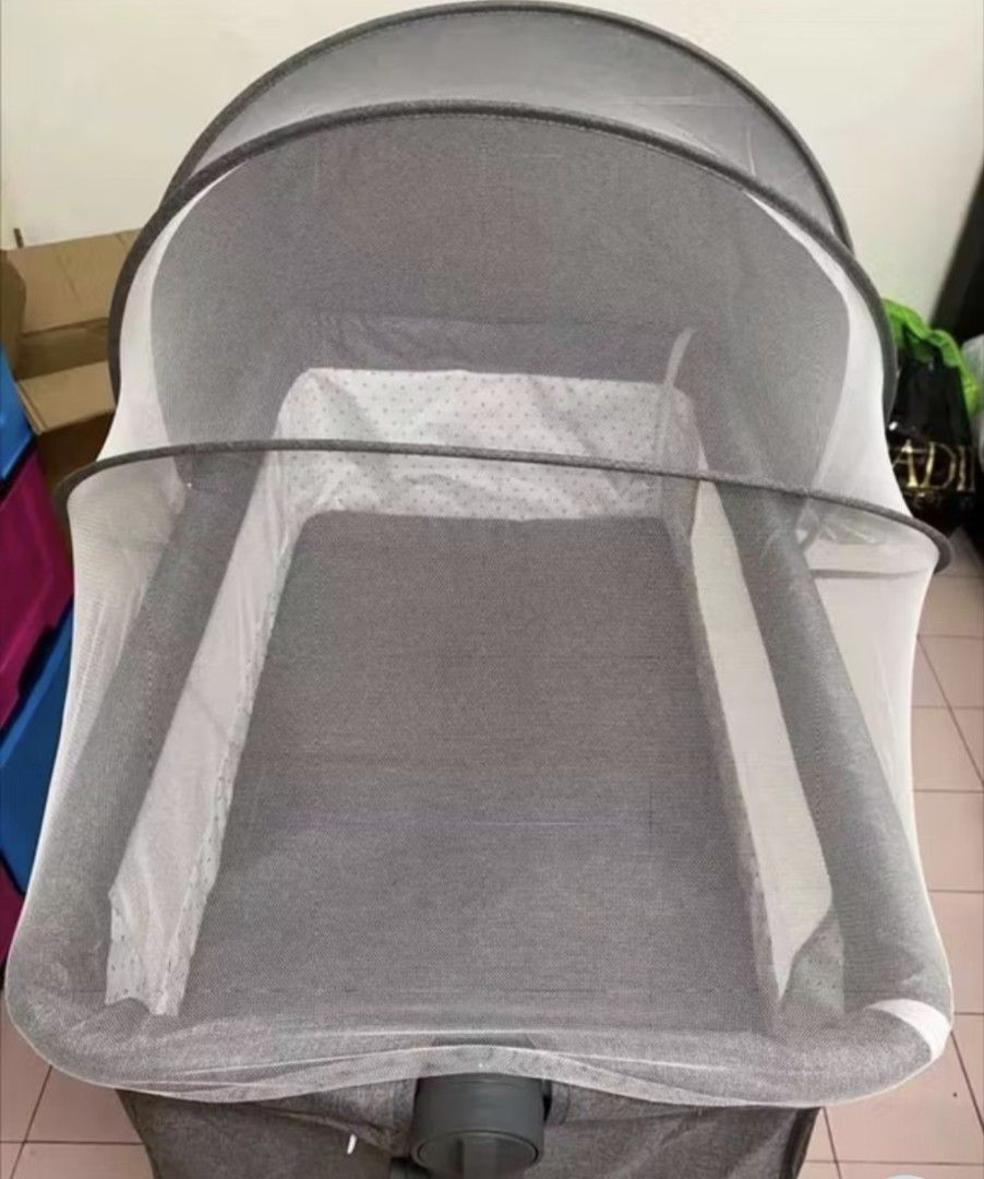 Baby Bassinet with Mosquito Net (Category: Cots & Cribs) located in Tarlac. Submitted by bunsoflove05 (Listing ID 1430023770, Image 3). Description: Baby bassinet features a mosquito net and a foldable design for easy storage and transport. It has a gray and black color scheme. The frame has a rocking function. It is suitable for newborns and infants..