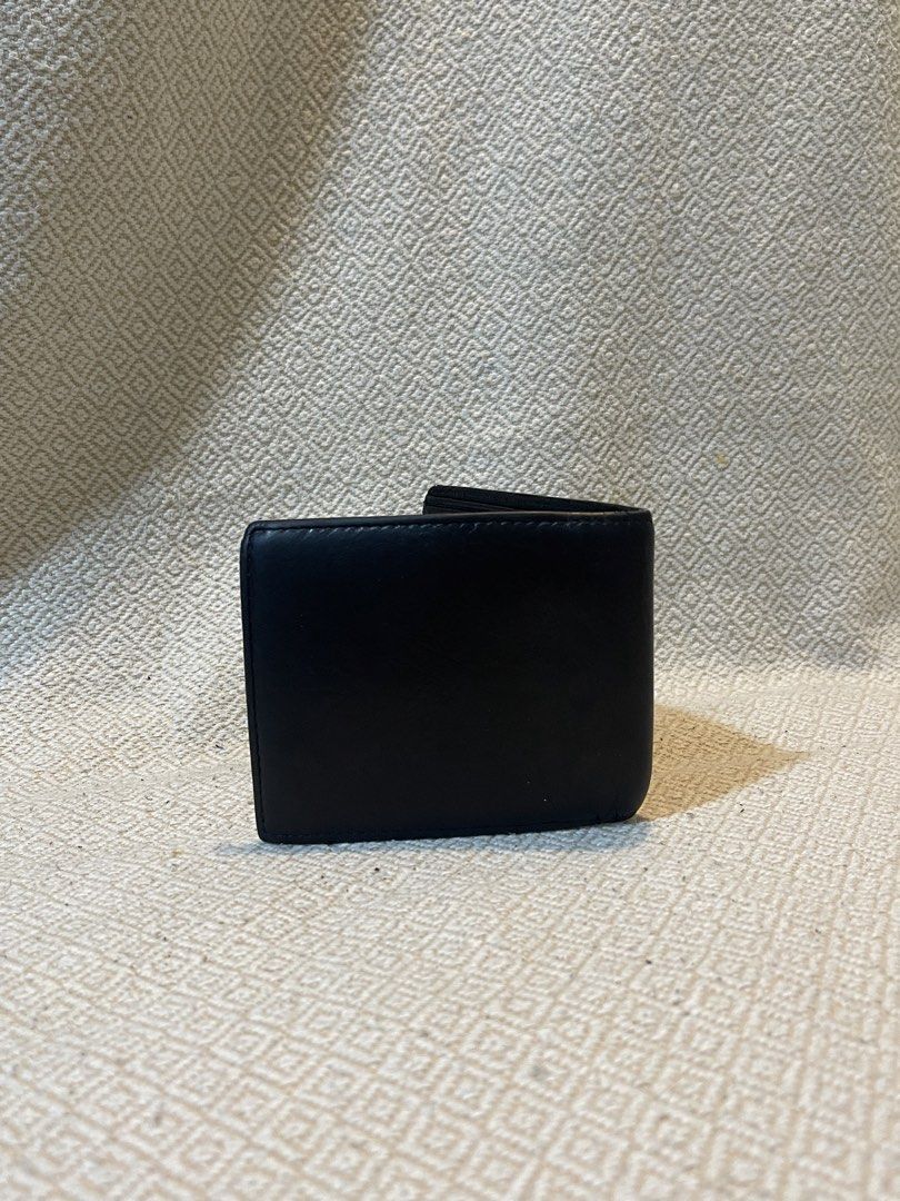 Balenciaga Black Leather Wallet (Category: Luxury Bags & Wallets) located in Manila. Submitted by hypestock_mnl (Listing ID 1430004475, Image 3). Description: - Balenciaga black leather bifold wallet. - Classic design. - Features multiple card slots. - Made from quality leather..