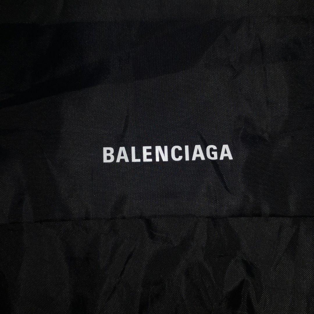 Balenciaga Nylon Dust Bag/ Backpack (Black) (Category: Luxury Bags & Wallets) located in General Mariano Alvarez. Submitted by hundred_lives (Listing ID 1429947942, Image 2). Description: Balenciaga Nylon Dust Bag/ Backpack (Black) Excellent Condition Good As New No Issue Adjustable Drawstrings ‼️***Or Best Offer Wins***‼️ ‼️***Split Or As Pack***‼️ ‼️***Negotiable All Items***‼️ Tags: burberry fendi mcm givenchy yohji yamamoto rick owens prada d
