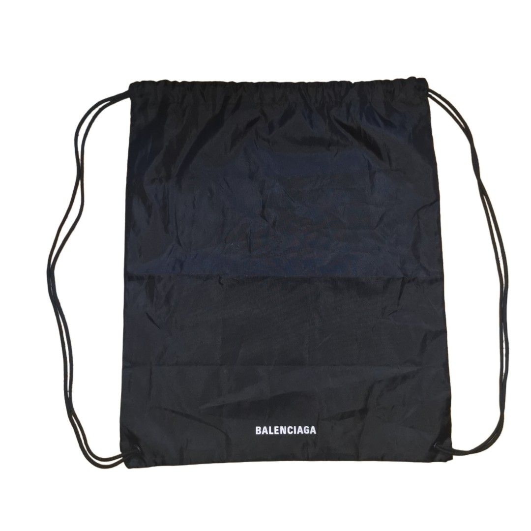 Balenciaga Nylon Dust Bag/ Backpack (Black) (Category: Luxury Bags & Wallets) located in General Mariano Alvarez. Submitted by hundred_lives (Listing ID 1429947942, Image 1). Description: Balenciaga Nylon Dust Bag/ Backpack (Black) Excellent Condition Good As New No Issue Adjustable Drawstrings ‼️***Or Best Offer Wins***‼️ ‼️***Split Or As Pack***‼️ ‼️***Negotiable All Items***‼️ Tags: burberry fendi mcm givenchy yohji yamamoto rick owens prada d