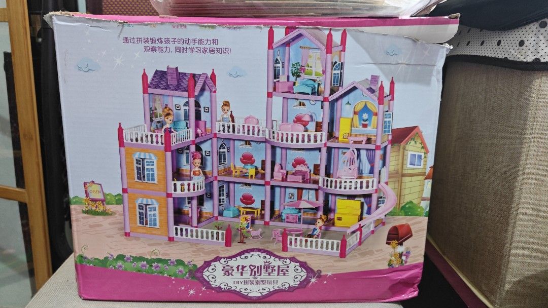 Big Dollhouse with Accessories (Category: Kids Toys) located in Manila. Submitted by skyreva (Listing ID 1429868994, Image 1). Description: Only assembled once. Not really played. original price is 1k plus.
