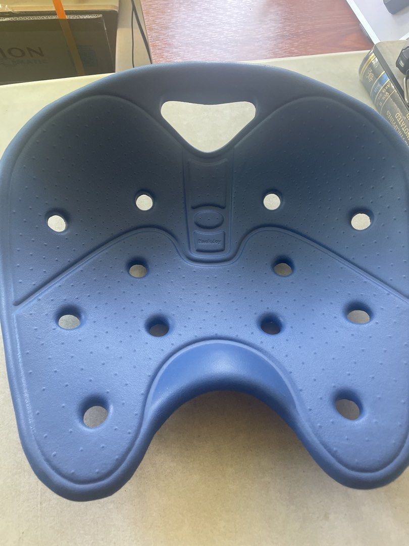 Blue Ergonomic Seat (Category: Chairs) located in Tuguegarao City. Submitted by tobybailey (Listing ID 1429915938, Image 1). Description: Backjoy.