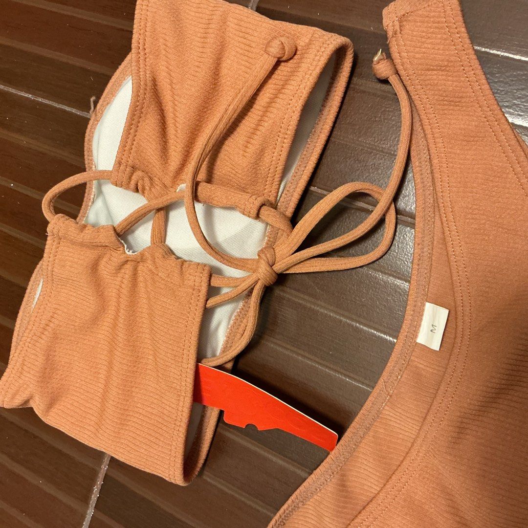 Brandnew swimsuit two-piece bikini (Category: Bikinis & Swimsuits) located in Manila. Submitted by ___purpleeeet__ (Listing ID 1429879868, Image 3). Description: Orange tube with tag and plastic - 99php S-M size Highwaist black with plastic - 99php S-M size.