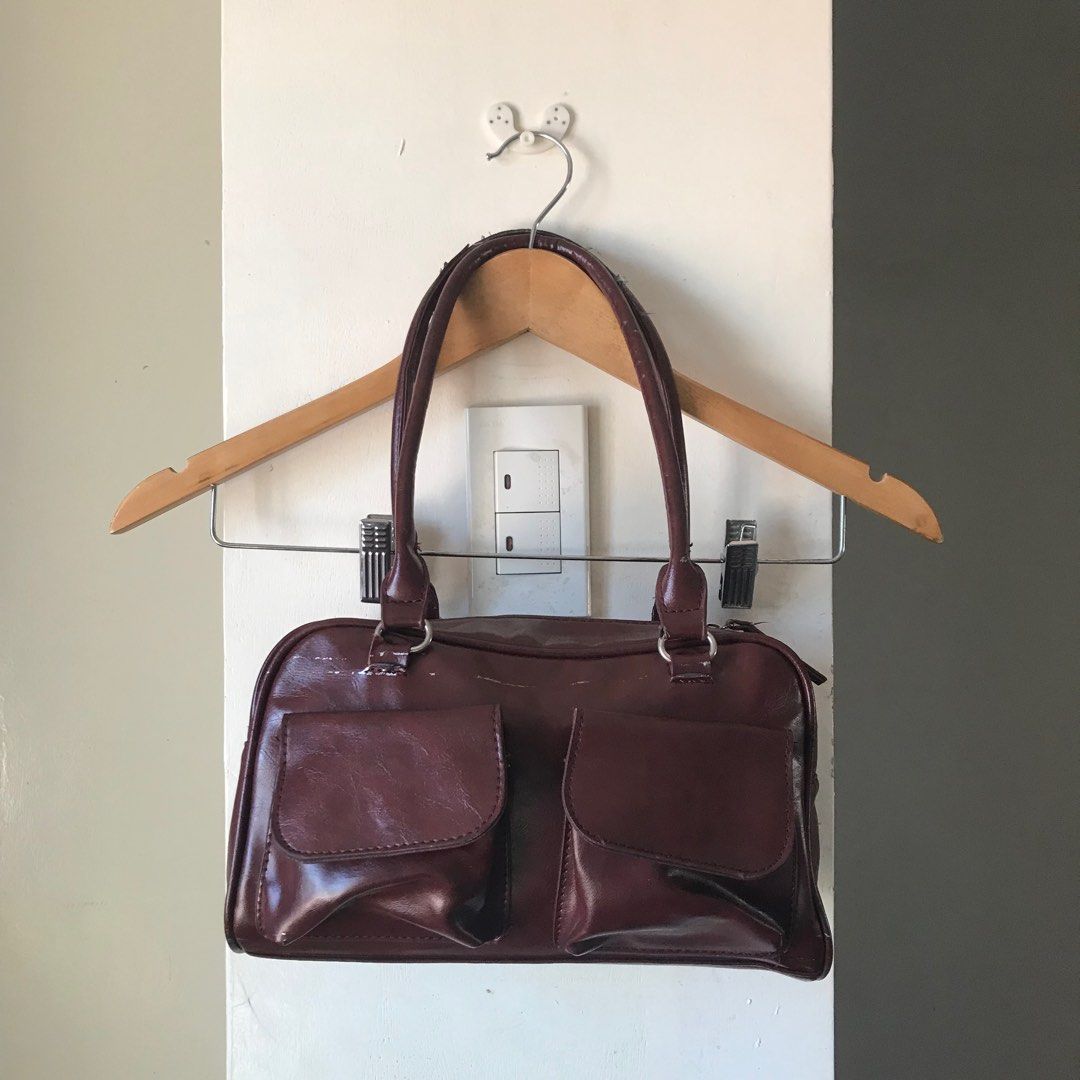 Burgundy Maroon Red Leather Shoulder Bag (Category: Shoulder Bags) located in Marikina City. Submitted by altvxz (Listing ID 1429847500, Image 1). Description: Has minimal stains (can be repaired on shops or can be removed with Wipe Out) Can give it for free if purchasing ₱500 above :).