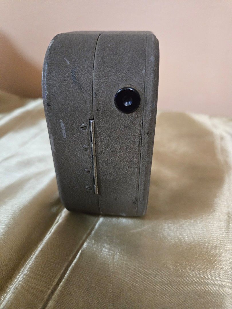 Camera (Category: Cameras) located in Singapore. Submitted by shamjay2467 (Listing ID 1429952814, Image 4). Description: - Vintage camera - Classic design - Metal detailing - Unique item for collectors - Perfect for film photography enthusiasts.