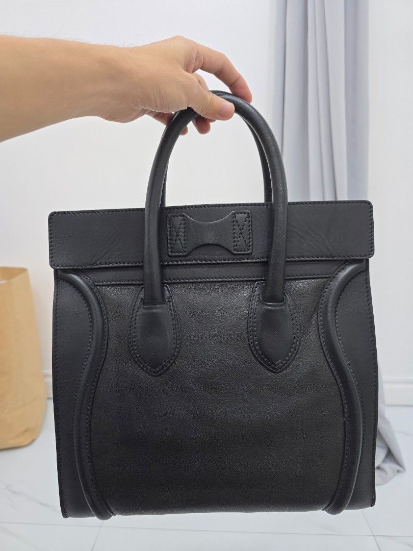 Celine Mini Luggage Tote Bag (Category: Luxury Bags & Wallets) located in Las Pinas. Submitted by vanpru (Listing ID 1430008188, Image 2). Description: Celine mini luggage tote Well used with signs of use.