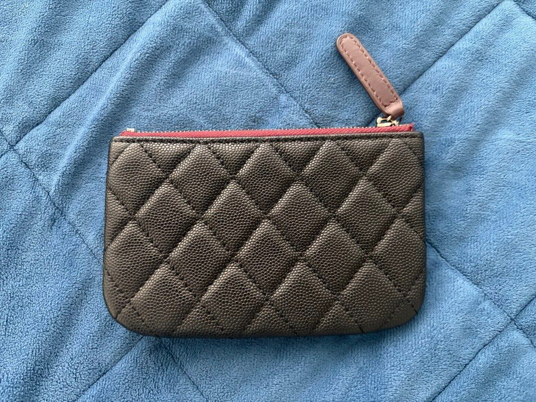 Chanel Caviar Leather Zip Wallet (Category: Luxury Bags & Wallets) located in Mandaluyong City. Submitted by benben12f (Listing ID 1429893930, Image 2). Description: With code small O Case zip pouch in black caviar leather with aged ruthenium hardware. No inclusions..
