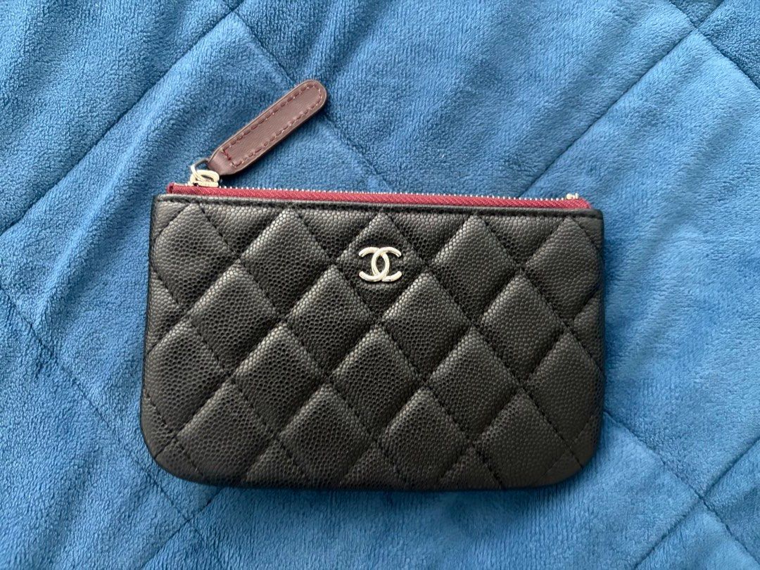 Chanel Caviar Leather Zip Wallet (Category: Luxury Bags & Wallets) located in Mandaluyong City. Submitted by benben12f (Listing ID 1429893930, Image 1). Description: With code small O Case zip pouch in black caviar leather with aged ruthenium hardware. No inclusions..