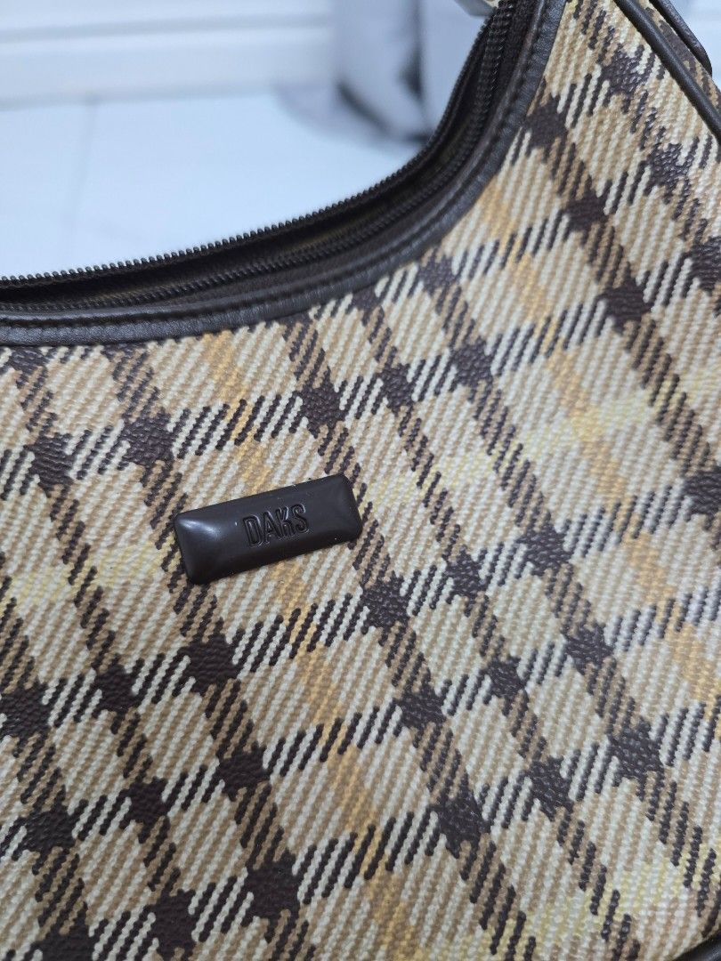 Daks Shoulder Bag (Category: Shoulder Bags) located in Las Pinas. Submitted by vanpru (Listing ID 1430007181, Image 2). Description: Daks mini shoulder bag With minimal signs of use.