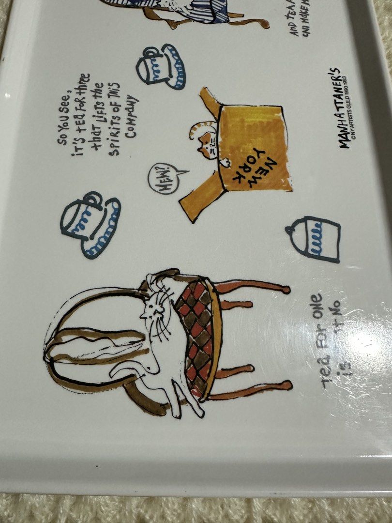 decorative melamine serving tray (Category: Dinnerware & Cutlery) located in Davao. Submitted by favoritepreloved (Listing ID 1429995220, Image 3). Description: ❤️featuring illustrations of cats in chairs and a box, produced by the Manhattaner’s Artists Guild in 1990 and 1993. ❤️It is a collectible item designed with a whimsical theme centered around tea time and cats. ❤️ Size: 34.5cm x 22.5cm.