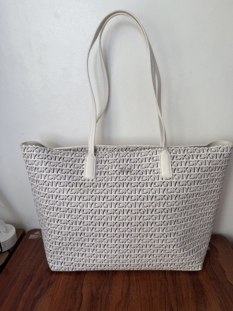 DKNY White Tote Bag (Category: Tote Bags) located in Quezon City. Submitted by decluttermarla (Listing ID 1429920344, Image 1). Description: Originally posted 2000.