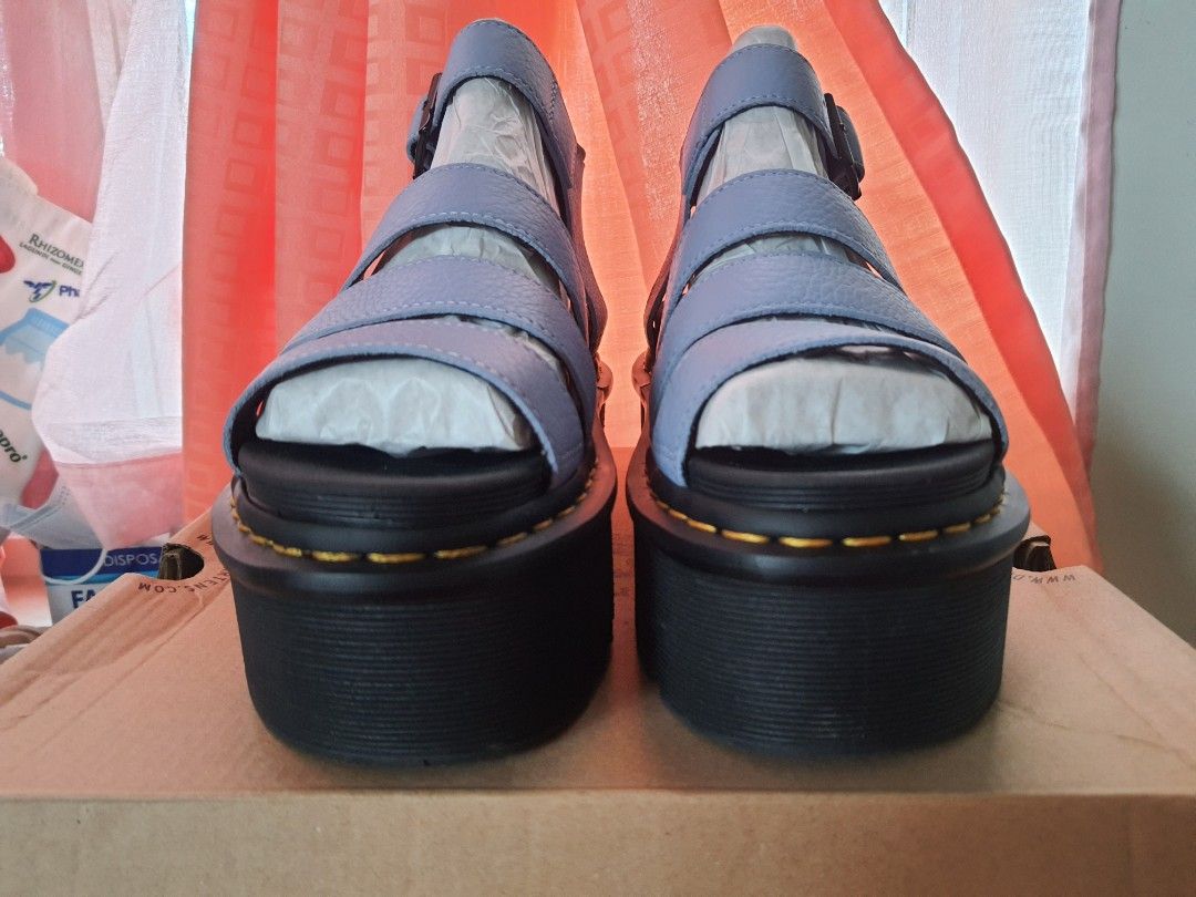 Dr. Martens Blaire Quad Zen Blue Platform Sandals (Category: Heels) located in Pasig City. Submitted by zmabel (Listing ID 1429958401, Image 2). Description: Worn once only (very lightly). Also legitimate Docs. I am a wide 24.5cm, and this one fits with a bit more wiggle room. RFS: Decluttering, moving on from chunky era. Delivery via grab/lala/etc and will be shouldered by the buyer..