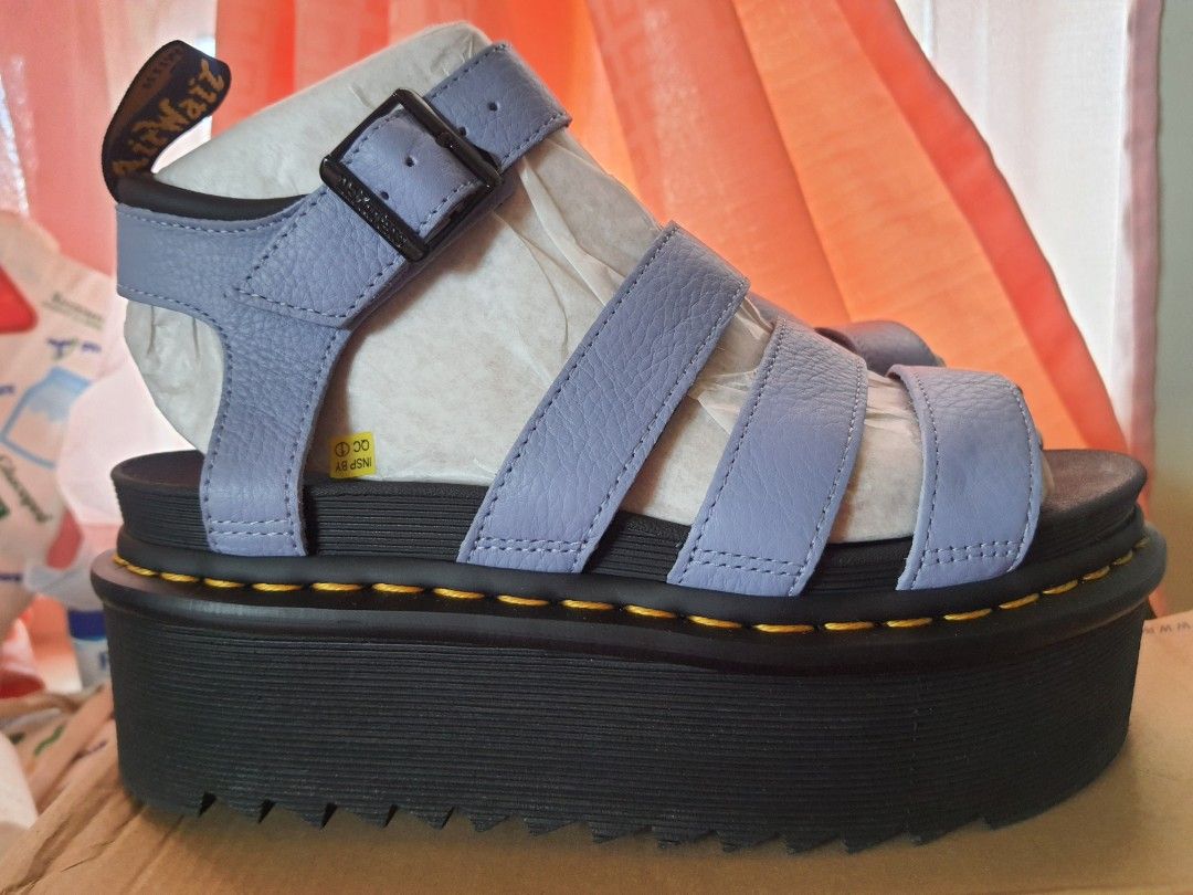 Dr. Martens Blaire Quad Zen Blue Platform Sandals (Category: Heels) located in Pasig City. Submitted by zmabel (Listing ID 1429958401, Image 1). Description: Worn once only (very lightly). Also legitimate Docs. I am a wide 24.5cm, and this one fits with a bit more wiggle room. RFS: Decluttering, moving on from chunky era. Delivery via grab/lala/etc and will be shouldered by the buyer..