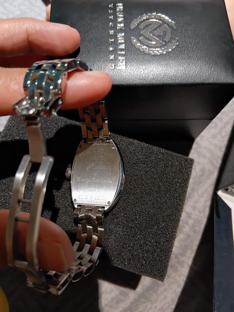 Franck Muller Ladies Watch (Category: Luxury Watches) located in Cainta. Submitted by lilicute06 (Listing ID 1429934963, Image 2). Description: Franck Muller ladies watch with a silver-tone stainless steel bracelet. The watch features a white dial with black Arabic numeral hour markers. The watch comes with its original box. The back of the watch is engraved with "Franck Muller Geneve" and "Complications"..