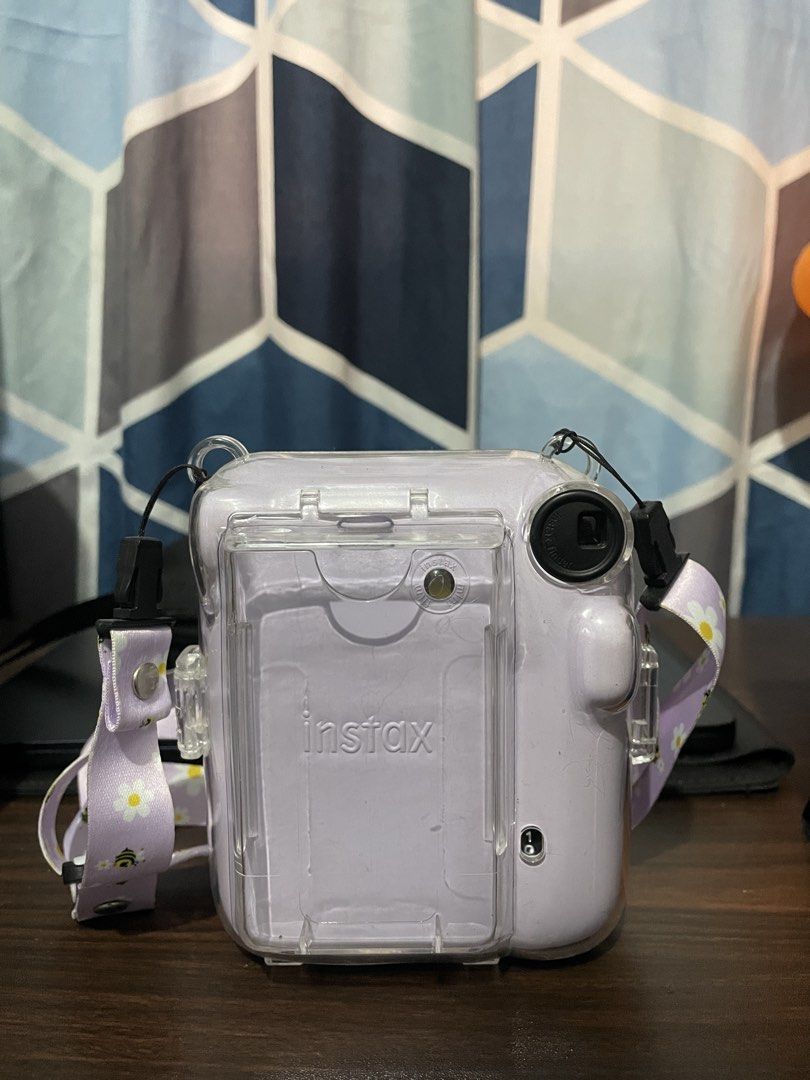 Fujifilm Instax Mini 12 - Lilac Purple (Category: Cameras) located in Angeles City. Submitted by doooospordos (Listing ID 1429861504, Image 2). Description: - With case and strap - Good as new RUSHHHH .