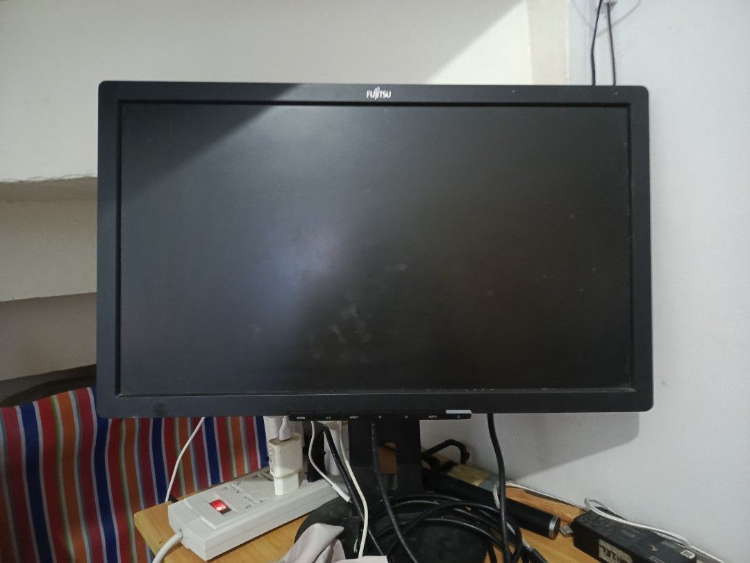 Fujitsu Monitor (Category: Monitor Screens) located in Antipolo. Submitted by happygem_2013 (Listing ID 1429922015, Image 1). Description: 22 inch, HDMI, VGA, DVI port issue: tiny black spot when the screen is showing white. I can provide more details/photos for sure buyer..
