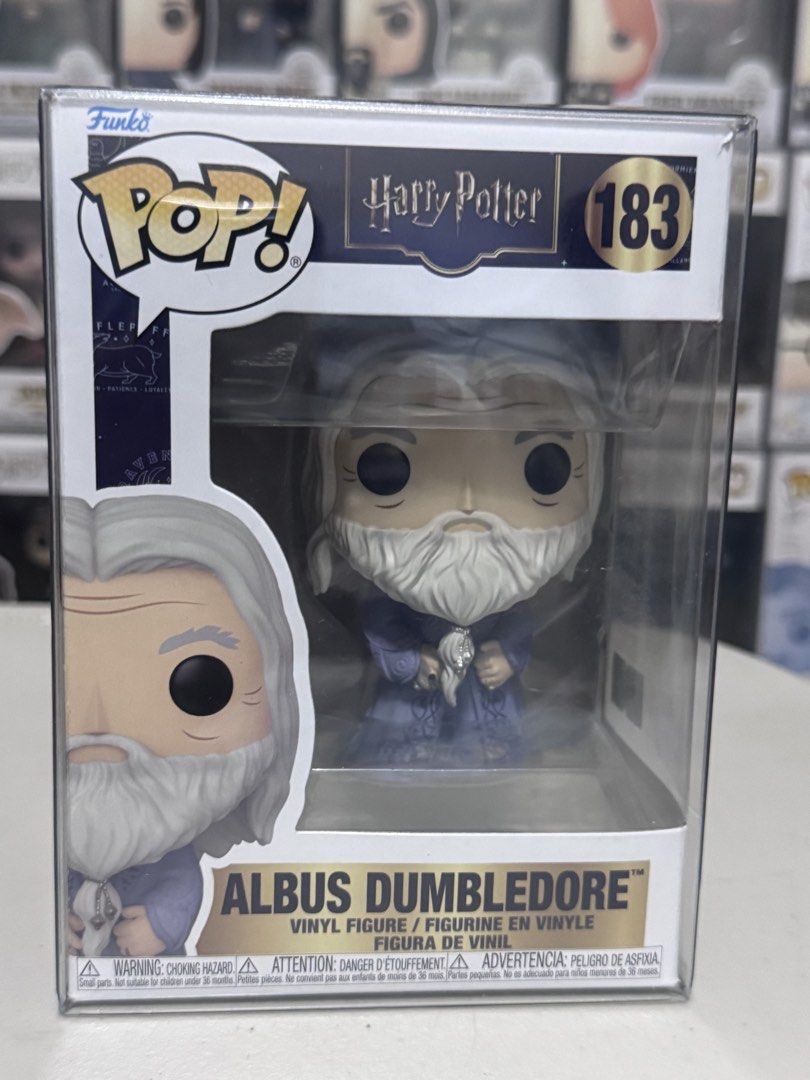 Funko Pop! Harry Potter Albus Dumbledore #183 (Category: Designer & Blind Box Toys) located in Marikina City. Submitted by jaymspj (Listing ID 1429878121, Image 1). Description: Funko Pop! vinyl figure of Albus Dumbledore from the Harry Potter series. It is number 183 in the collection. The figure is in its original packaging. The box features the Funko Pop! logo and the Harry Potter logo. The figure is of Dumbledore in his robes. With Boss Prote
