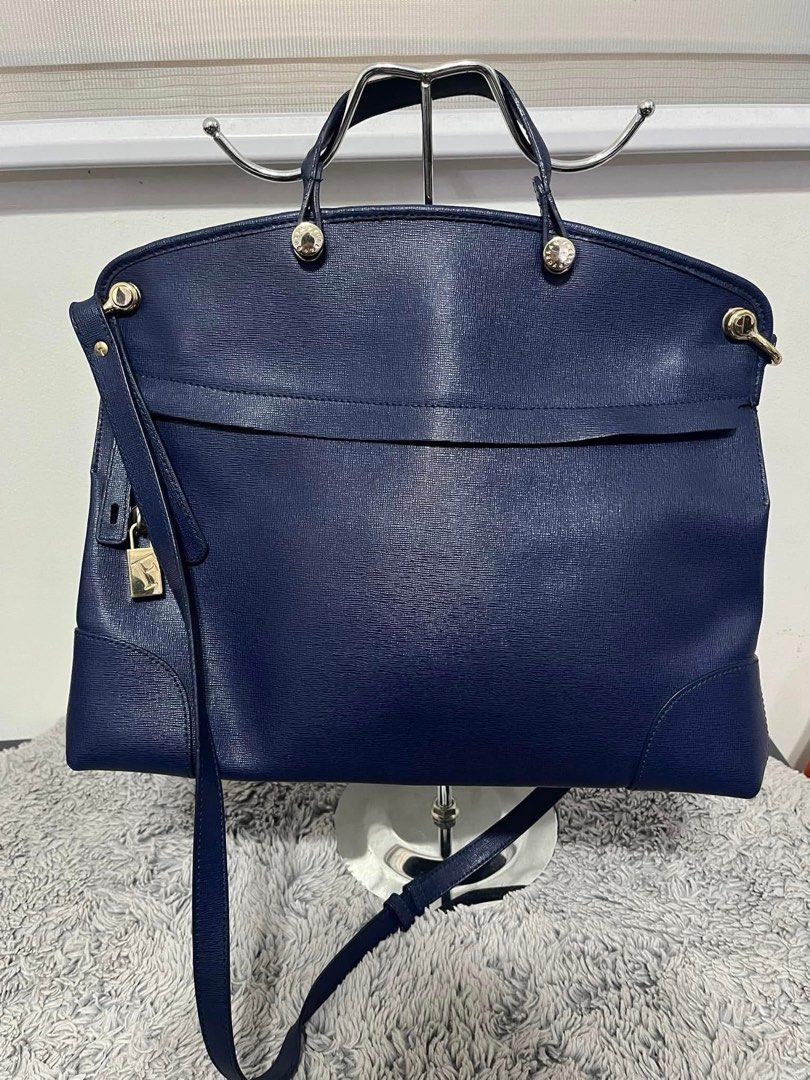 Furla Piper with Shoulder Strap (Category: Luxury Bags & Wallets) located in Quezon City. Submitted by samellie (Listing ID 1429999638, Image 1). Description: .
