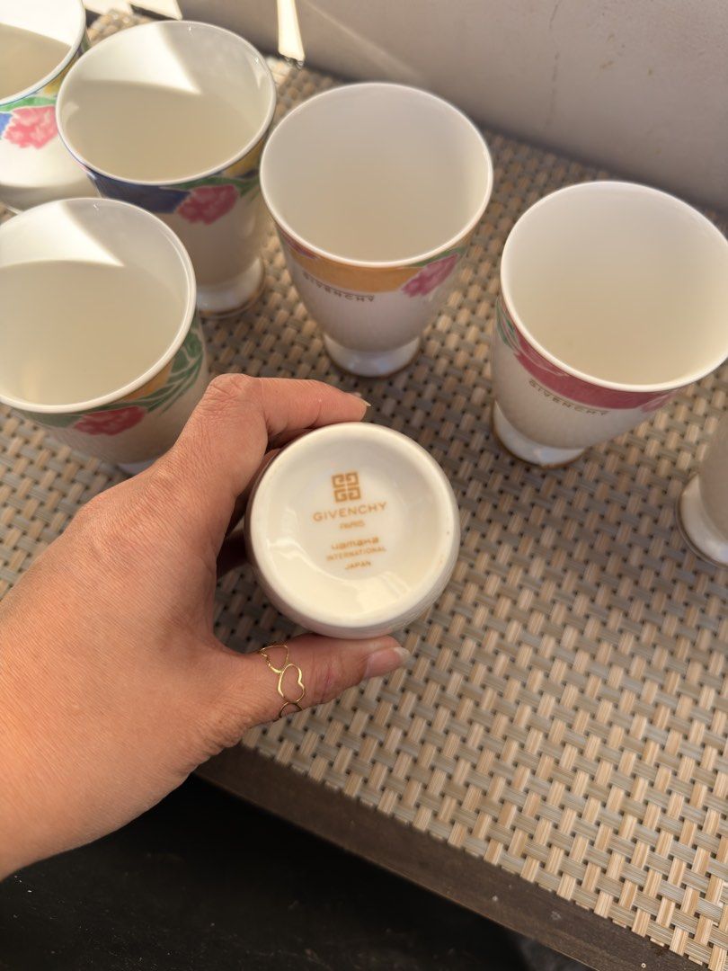 Givenchy Floral Design Footed Cups (Category: Coffee & Tea Tableware) located in Bulacan. Submitted by fancy.surplusera (Listing ID 1429883570, Image 3). Description: Set of Givenchy cups featuring a floral design with beverage cups. Condition: 9/10 Size: 7.3cm x 100 Price sold per piece. .