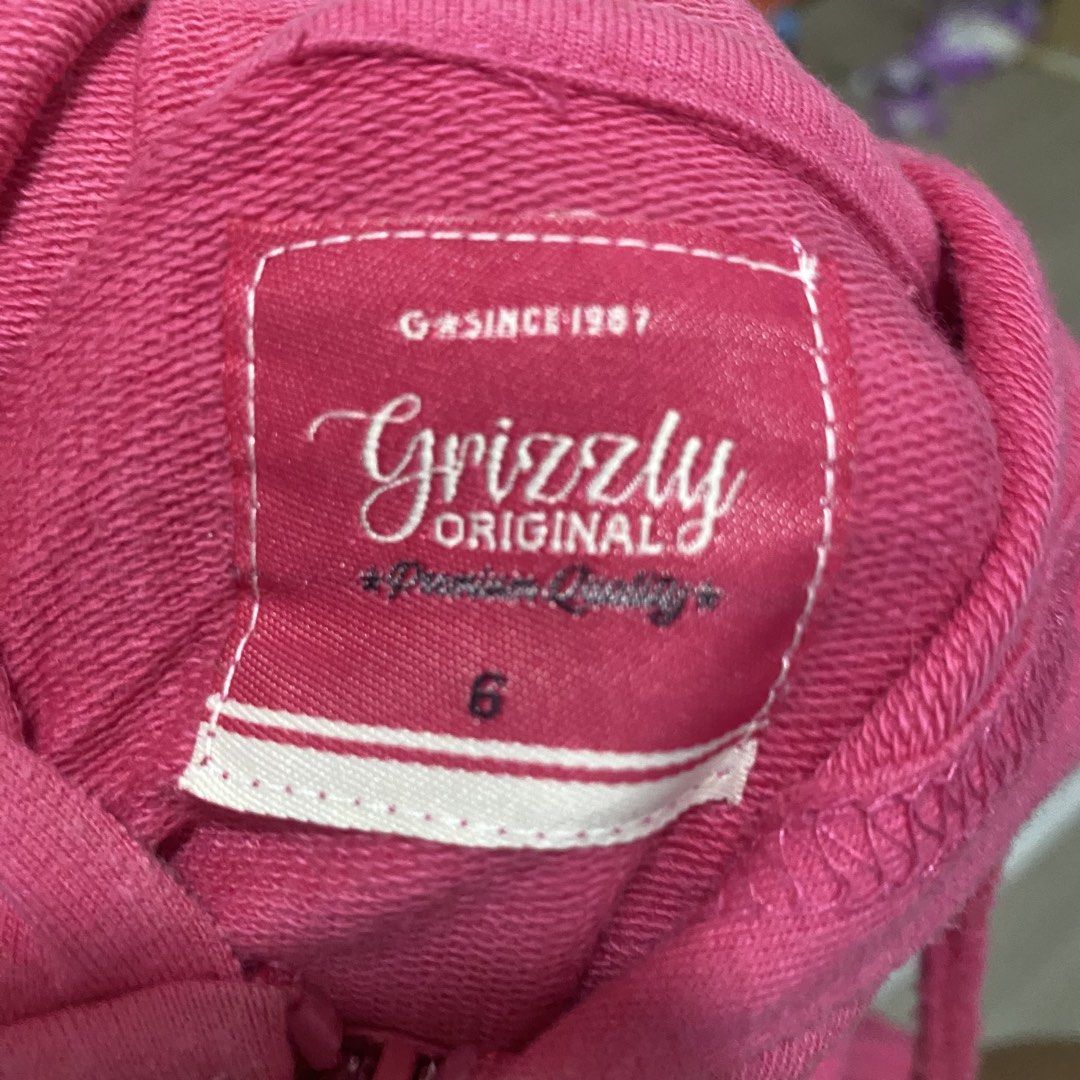 Grizzly Original 1987 Hoodie (Category: Babies & Kids Fashion) located in General Trias. Submitted by heeeymich (Listing ID 1429990547, Image 2). Description: Pre-loved Pink Jacket of my Daughter - Pink Grizzly Original 1987 hoodie - Full zip - Size: 6 - White logo on front - Hood with drawstrings - Two front pockets - Soft material Location: General Trias, Cavite.