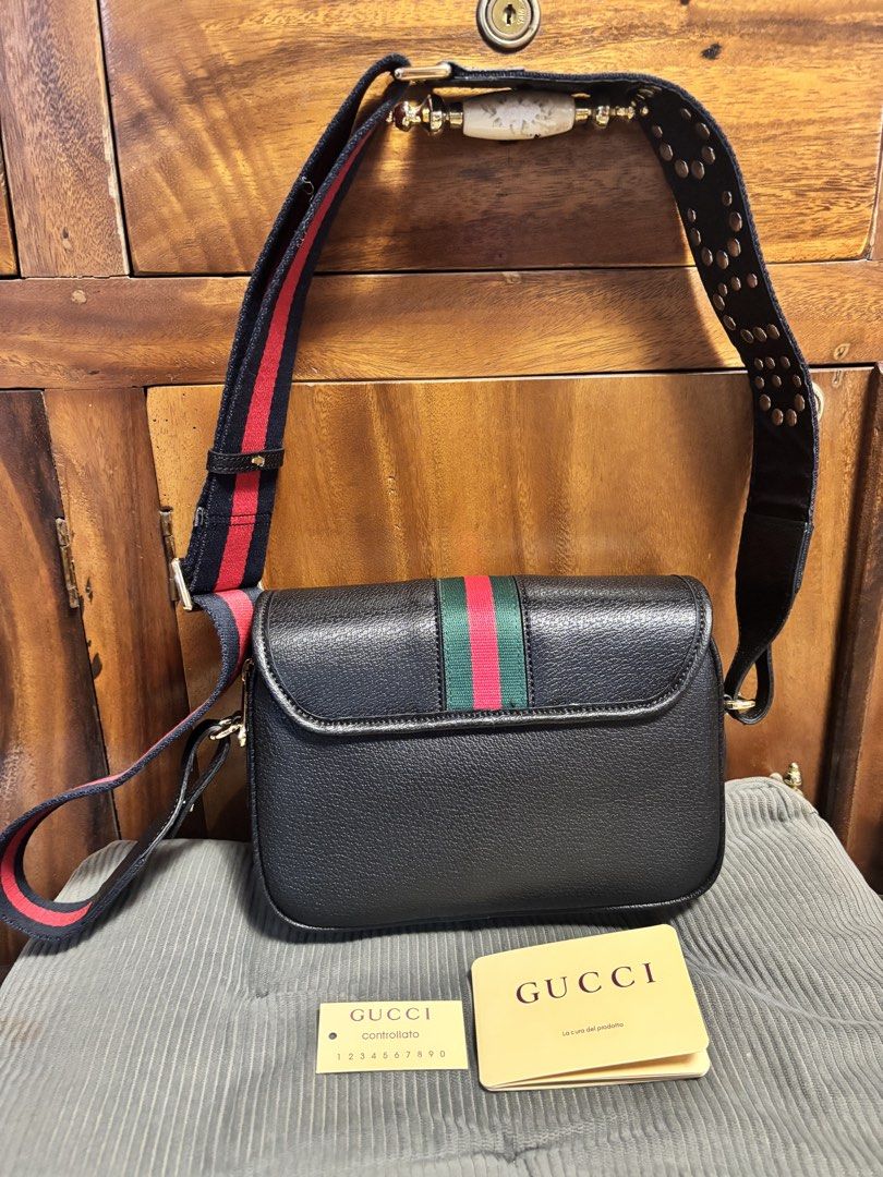 Gucci crossbody leather bag (Category: Luxury Bags & Wallets) located in Imus. Submitted by bagsofblessings24 (Listing ID 1429876179, Image 2). Description: Preloved Gucci medium leather bag With guitar and leather straps With control and warranty cards Excellent condition and quality Coded Guaranteed original by supplier but still for buyer’s authentication. No authenticity certificate that is why selling low. Length 9in x Height 6.5 in x Bottom