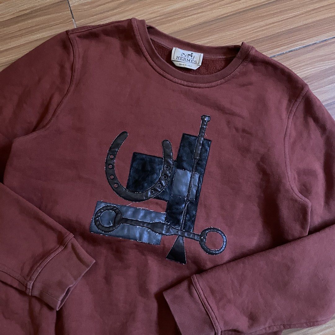 Hermes Puzzle Equestre Leather Patch Crewneck Sweatshirt (Category: Luxury Apparel) located in General Mariano Alvarez. Submitted by 4117_thriftnthrive (Listing ID 1429886583, Image 2). Description: Fair condition Loose stitch, scratch on leather Size on tag: S Measurements Width: 20” Length: 24”.