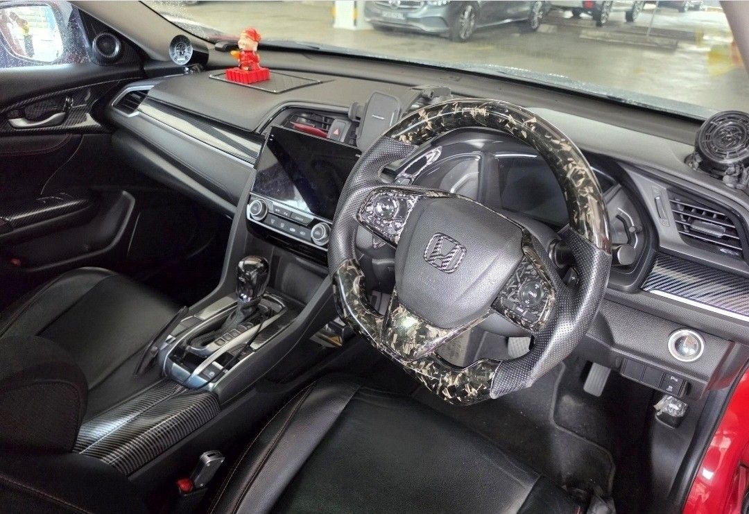 Honda Civic 1.6 VTi (A) (Category: Used Cars) located in Singapore. Submitted by chicagojango (Listing ID 1430022169, Image 3). Description: Type R body kit, Soundstream Android player, tweeter & speakers. 360 Camera. Carbon Fibre steering wheel and bonnet. Internal with CF parts. BCBR coilover. 18" rims with Brembo V6 front brakes & Brembo F40 rear brakes with Electronic..