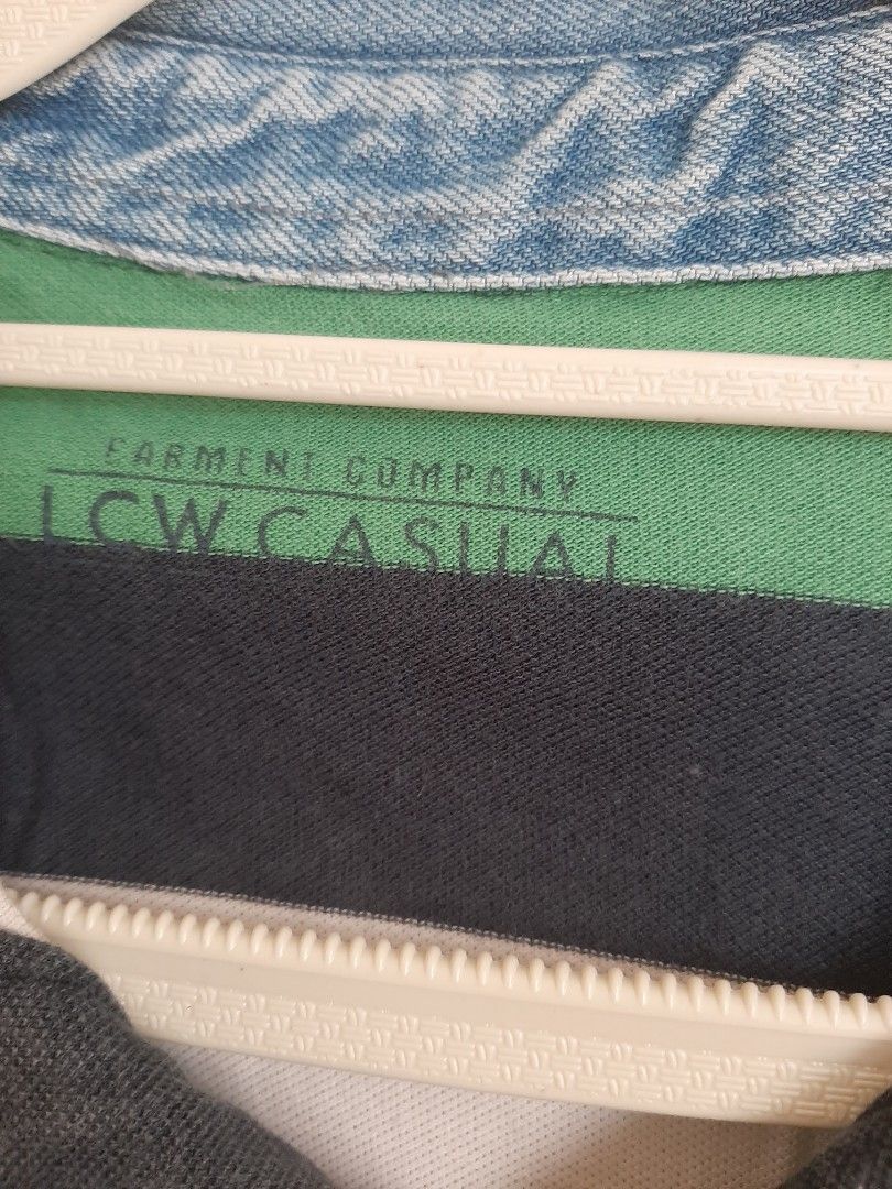 Casual Striped Polo Shirt (Category: Tshirts & Polo Shirts ) located in Las Pinas. Submitted by cj_e06 (Listing ID 1430023879, Image 2). Description: Polo shirt features a striped design with green, white, and navy blue colors. It has a denim collar and the text "NYC Montana 189" printed on the chest. The brand is LCW Casual..